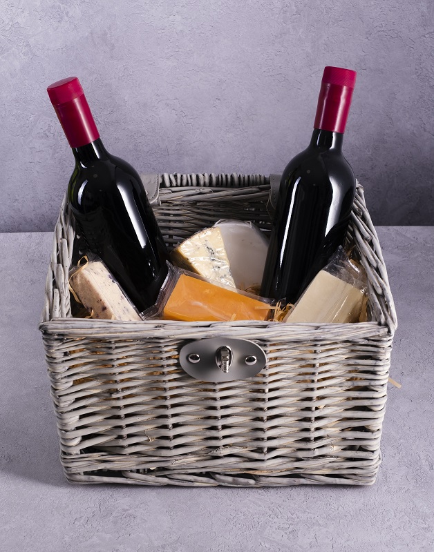 homemade wine gifted in hamper with cheese