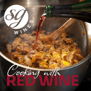 adding red wine to a beef stew during cooking
