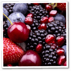 close up shot of mix of various black forest fruits